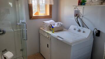 Shower, towels, toilet paper