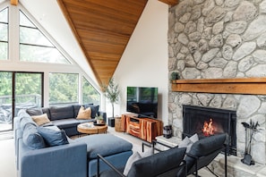 TV, fireplace - Ski In/Ski Out | 5BR Luxury Escape | Private Hot Tub | Garage | Managed By Aloha Whistler (Whistler)