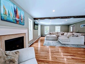 TV, fireplace, books, offices