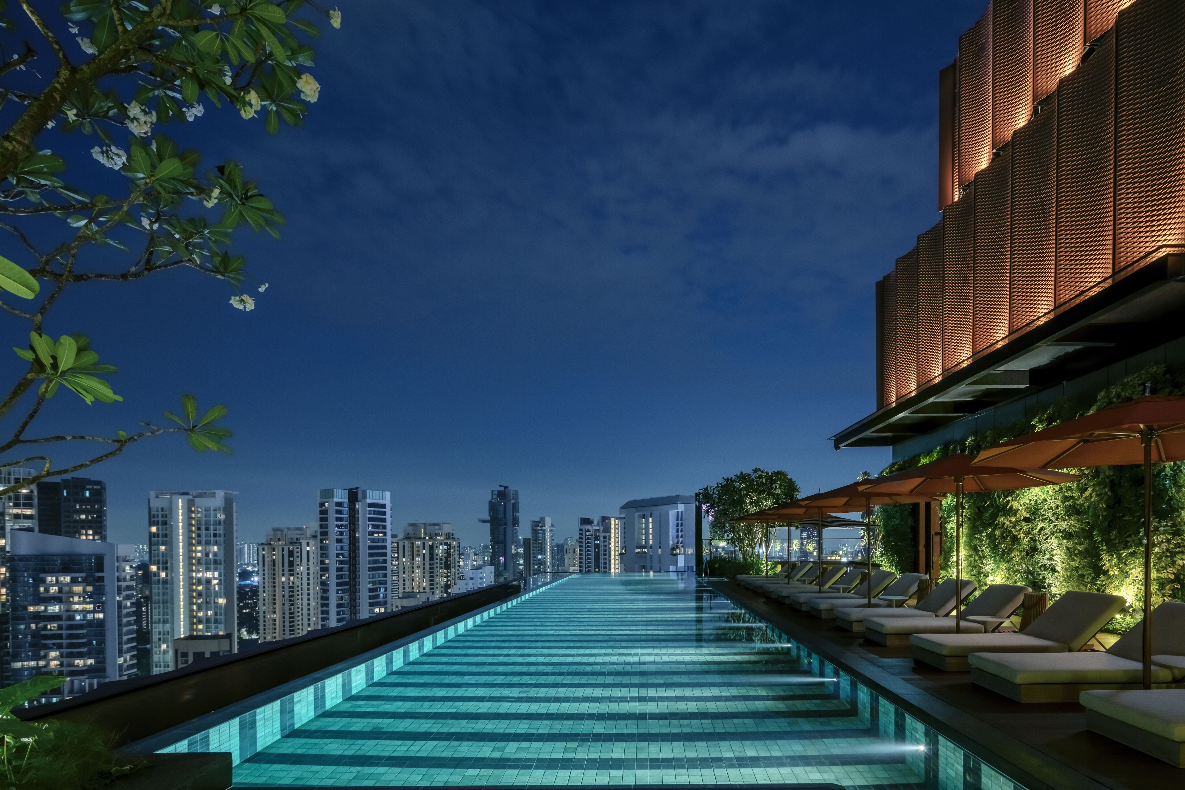 Outdoor pool, open 6:00 AM to 10:00 PM, pool umbrellas, sun loungers