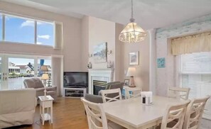 Smart TV, fireplace, DVD player, books