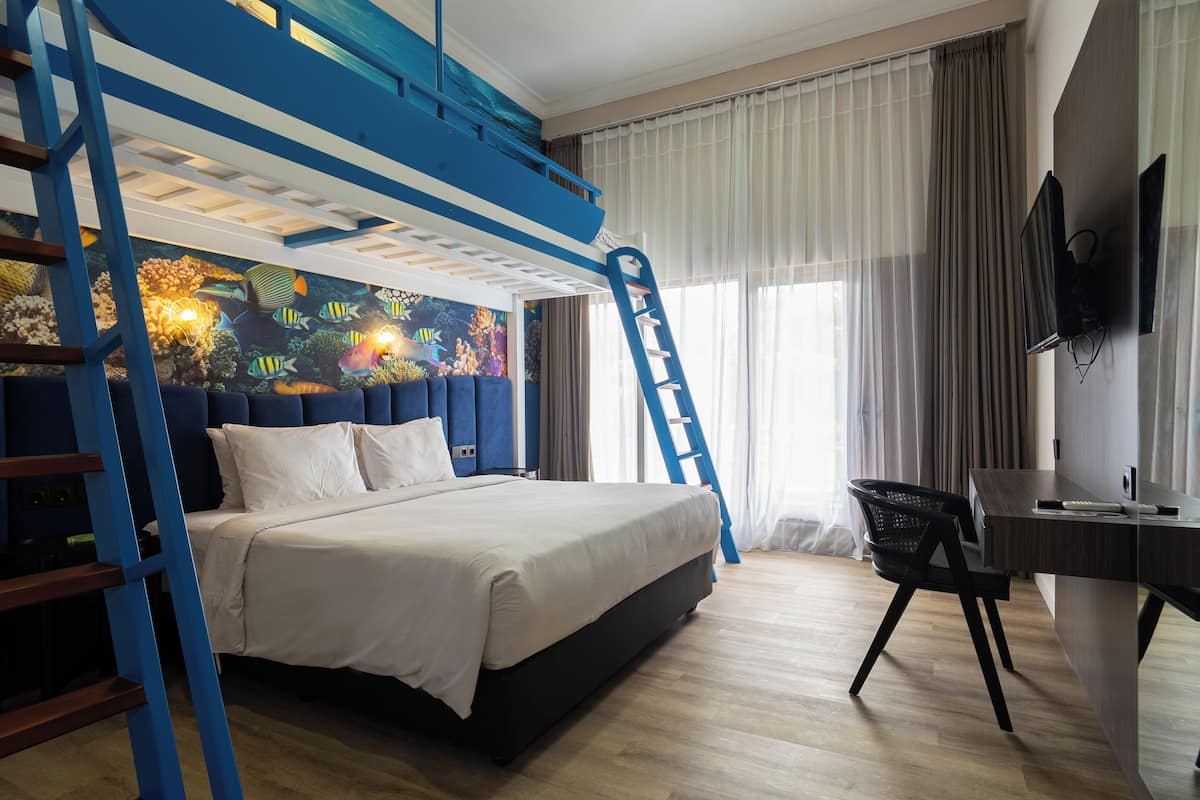 Family Ocean Room | 1 slaapkamer, een minibar, een bureau, geluiddichte muren