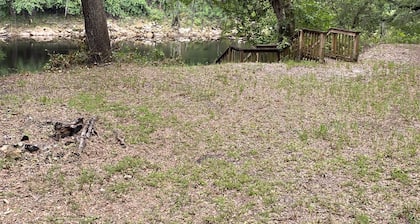 Campsite is locate on the suwannee river. Has power, water and RV hook up!