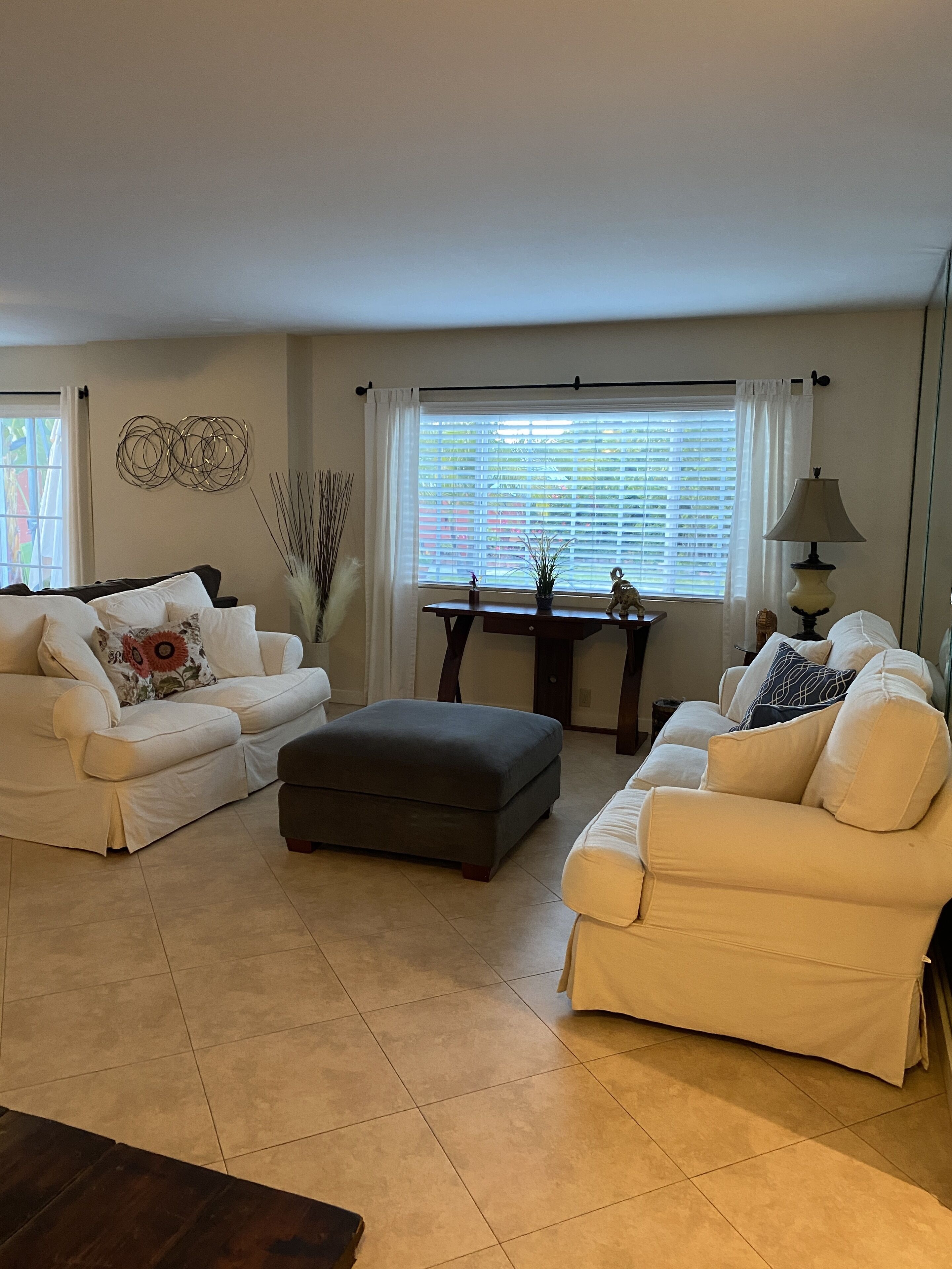 Mom's House is a one story house with a peaceful yard, pool and hot tub