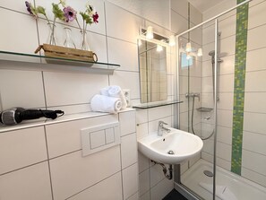 Shower, hair dryer