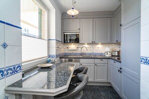 Imagen sin descripción, 5 de 11, botón