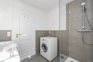 Shower, hair dryer, towels