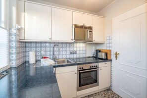 Niet-geclassificeerde afbeelding, 5 van 30, knop