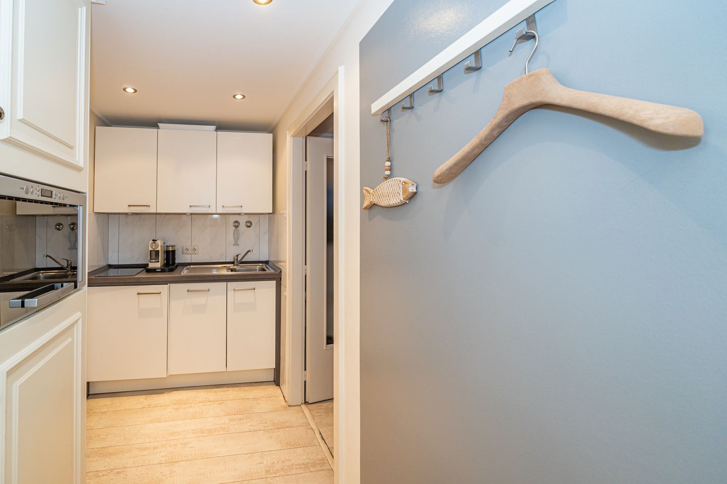 Fridge, stovetop, dishwasher, coffee/tea maker