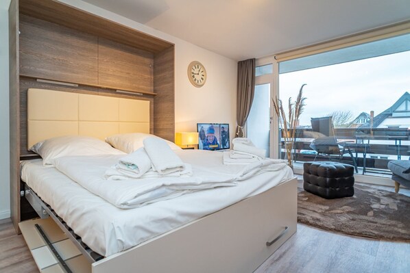 1 habitación, tabla de planchar con plancha, wifi y ropa de cama 