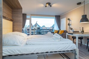 1 habitación, tabla de planchar con plancha, wifi y ropa de cama 