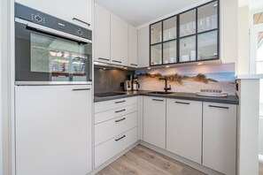 Réfrigérateur, four, plaque de cuisson, lave-vaisselle