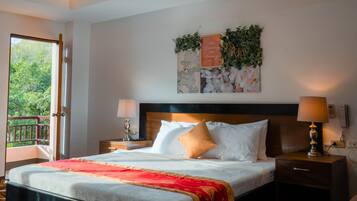 Laptop workspace, bed sheets