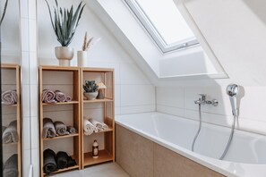 Bathtub, free toiletries, hair dryer, towels