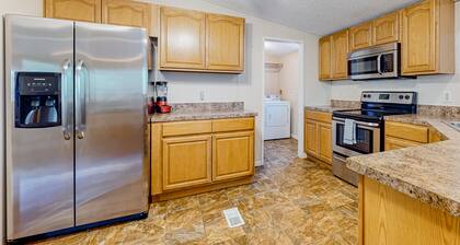 Riverfront home w/ free attraction tickets, water views, firepit, deck