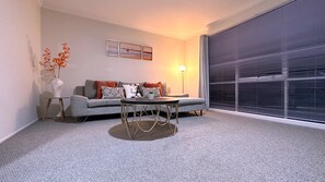 Standard Villa | Living area | 55-inch Smart TV with cable channels, TV - Close to Airport (Hillside)