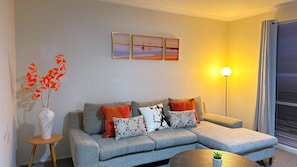 Standard Villa | Living area | 55-inch Smart TV with cable channels, TV - Close to Airport (Hillside)