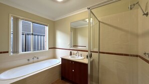 Shower, eco-friendly toiletries, hair dryer, towels