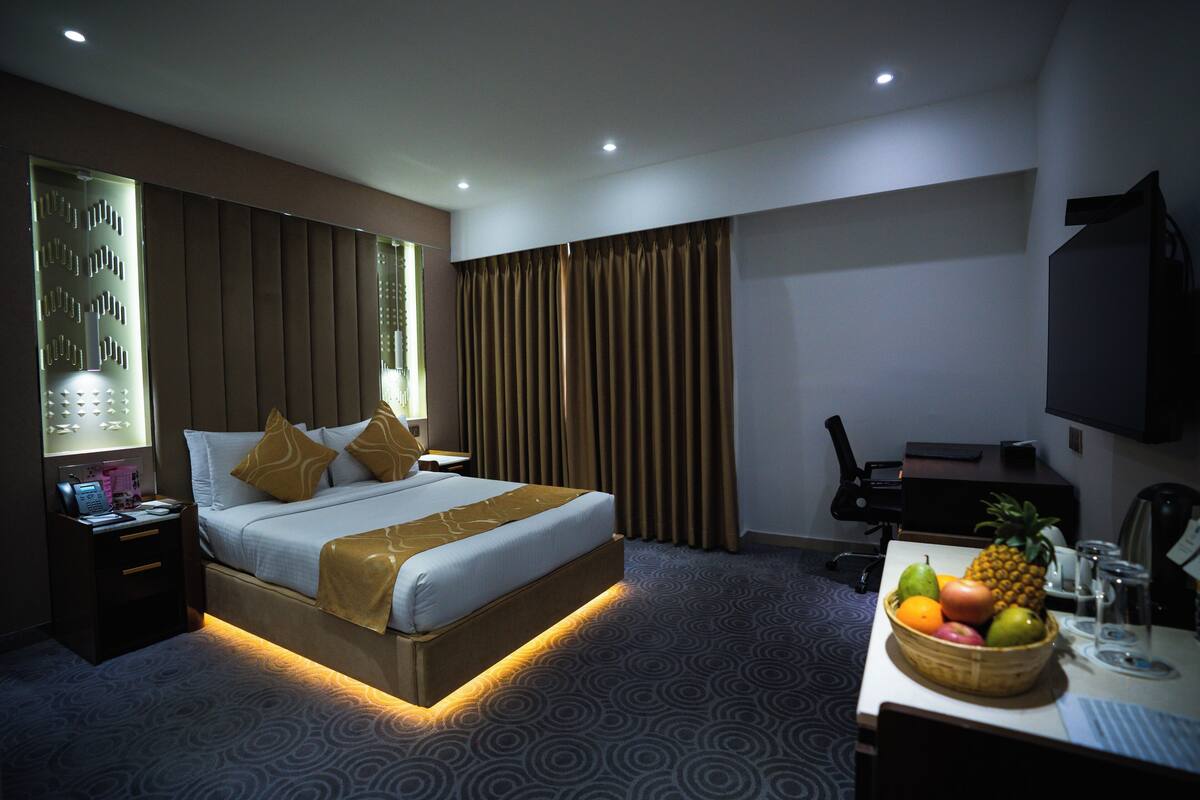 Minibar, desk, laptop workspace, blackout curtains