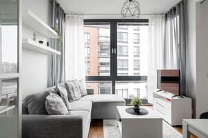 Premium Apartment | Living area | 39-inch Smart TV with cable channels, TV