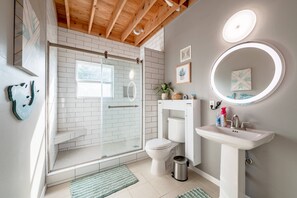 Hair dryer, towels, soap, shampoo