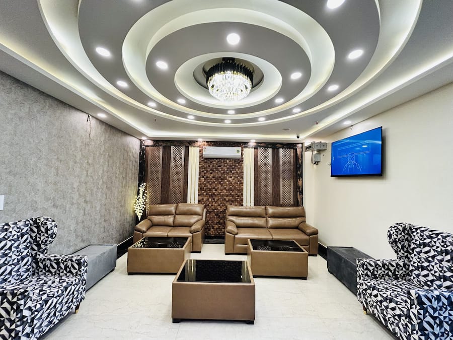 66-inch LED TV with digital channels, fireplace, pay films