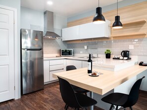 Family Suite, 2 Bedrooms | Living area | 43-inch flat-screen TV with cable channels, TV - HOTEL TANO (Tamuning)