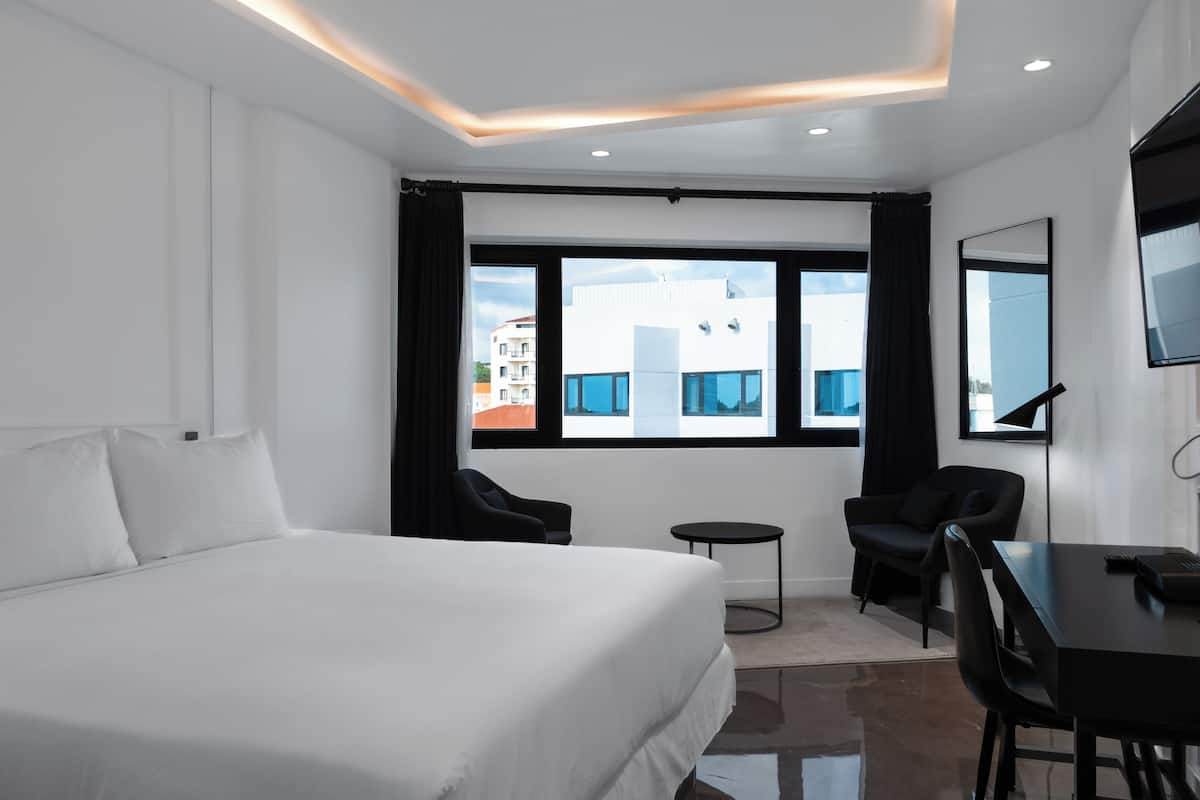 Deluxe Double Room, 1 Queen Bed | In-room safe, desk, laptop workspace, free WiFi