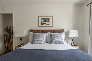 1 bedroom, desk, iron/ironing board, travel crib