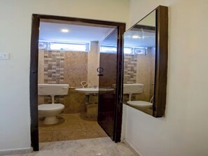 Basic Room | Bathroom | Shower, rainfall showerhead, towels - IVY RESIDENCY (Coimbatore)