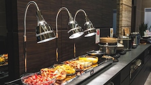 A buffet with various food items and a modern design with pendant lights. - Koko Hotel Premier Kanazawa Korinbo (Kanazawa)