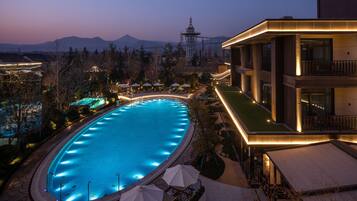 Indoor pool, outdoor pool, open 10:00 AM to 11:00 PM, pool umbrellas