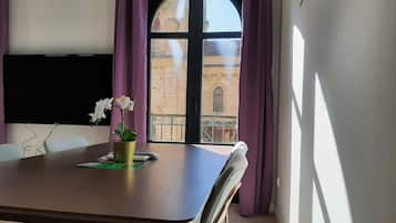 Deluxe Apartment | Living area | Smart TV