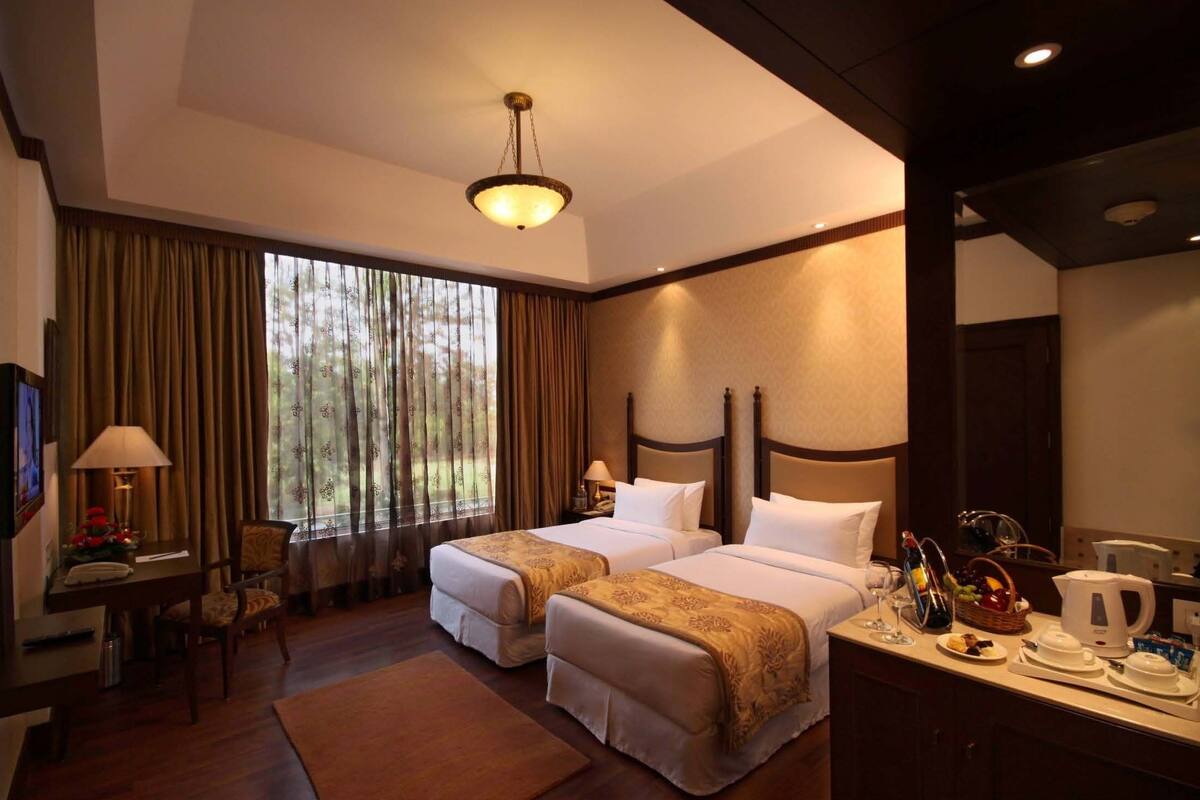 Kamar Superior | Seprai premium, selimut bulu angsa, busa memori, dan brankas