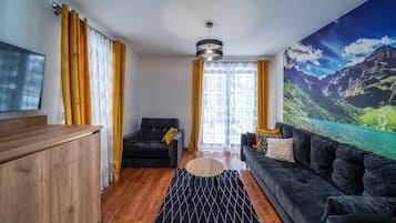 Apartment (D7) | Wohnbereich | Flachbildfernseher, Tischtennisplatte