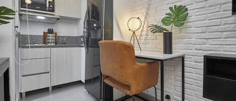 Fridge, microwave, stovetop, coffee/tea maker