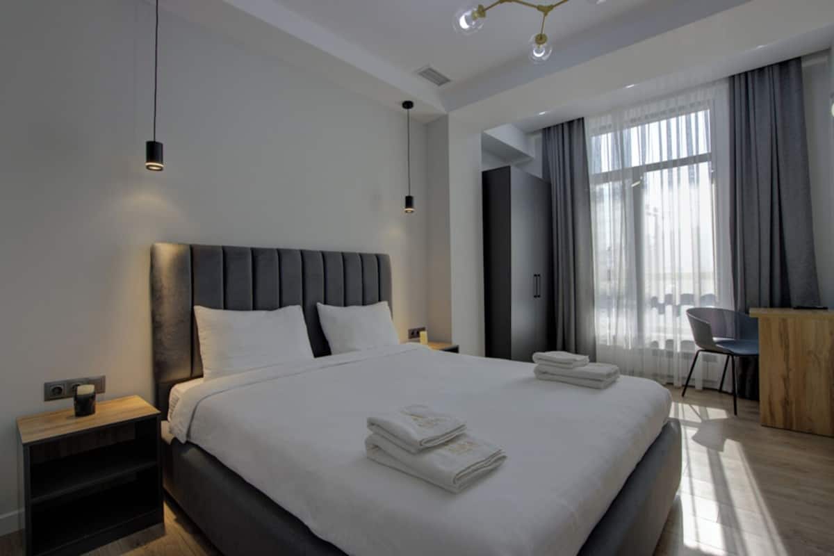In-room safe, desk, blackout curtains, soundproofing
