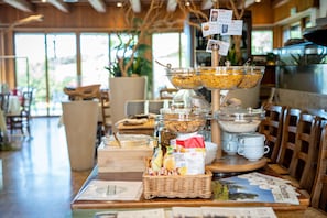 Enjoy a delicious breakfast spread with a variety of options at our restaurant.