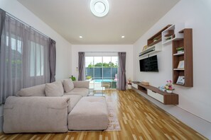 1 Bedroom Pool Villa with Pool View | Living room | 55-inch Smart TV with satellite channels, TV - Lark Pool Villa Krabi (Krabi)