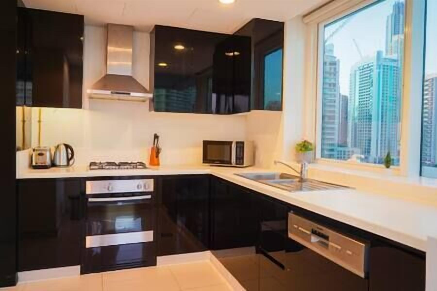 Fridge, coffee/tea maker, cookware/dishes/utensils