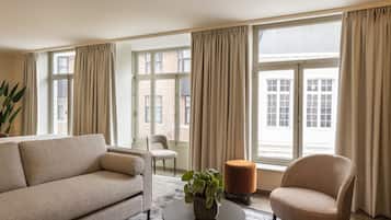 Deluxe Apartment, 2 Bedrooms, Terrace | Living area | 52-inch flat-screen TV with cable channels, TV