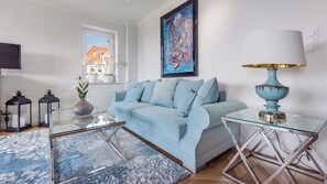 Apartment (ul. Wiejska 58/4) | Living area | Flat-screen TV - Apartamenty Sun & Snow Hel Centrum (Hel)