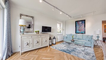 Apartamento (ul. Wiejska 58/4) | Zona de estar | Una televisión de pantalla plana