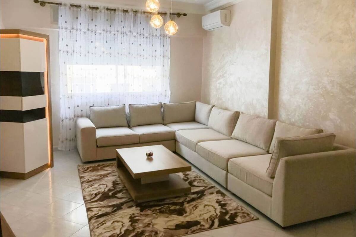 Apartment, 3 Bedrooms, City View | Living area | Smart TV