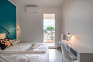 3 عدّة غرف نوم ومكواة/لوح كي وواي فاي وملاءات أسرّة