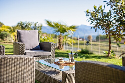 Appartement de vacances 'Weitblick Kaltern' avec vue sur la montagne, terrasse privée et jardin