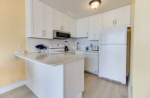 Condo, 1 Bedroom | Private kitchen | Fridge, oven, coffee/tea maker, toaster - 0709 Seaside Serenade by Atlantic Towers (Carolina Beach)