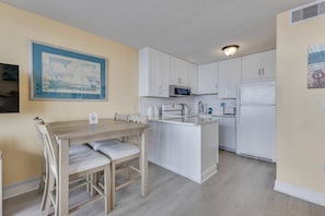 Condo, 1 Bedroom | Private kitchen | Fridge, oven, coffee/tea maker, toaster - 0709 Seaside Serenade by Atlantic Towers (Carolina Beach)