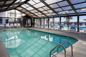 Relax by the pool with a view of the city.