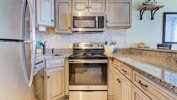 Condo, 2 Bedrooms | Private kitchen | Fridge, oven, coffee/tea maker, toaster